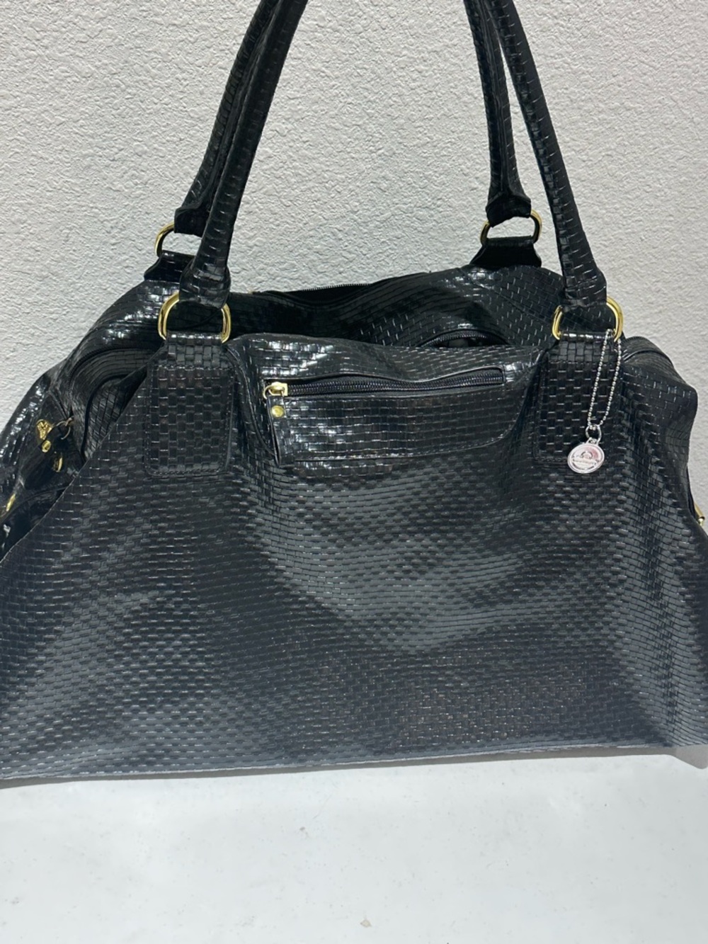 Big Buddha black woven weekender duffle style bag